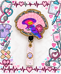 Pink and purple brain anatomy badge reel with printed labels and gold glitter edging