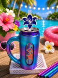 Blue lily flower straw topper on an iridescent blue-purple can holder mug with tropical background