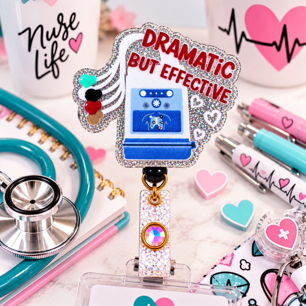 Glitter defibrillator badge reel with red lettering and iridescent gem-accented strap