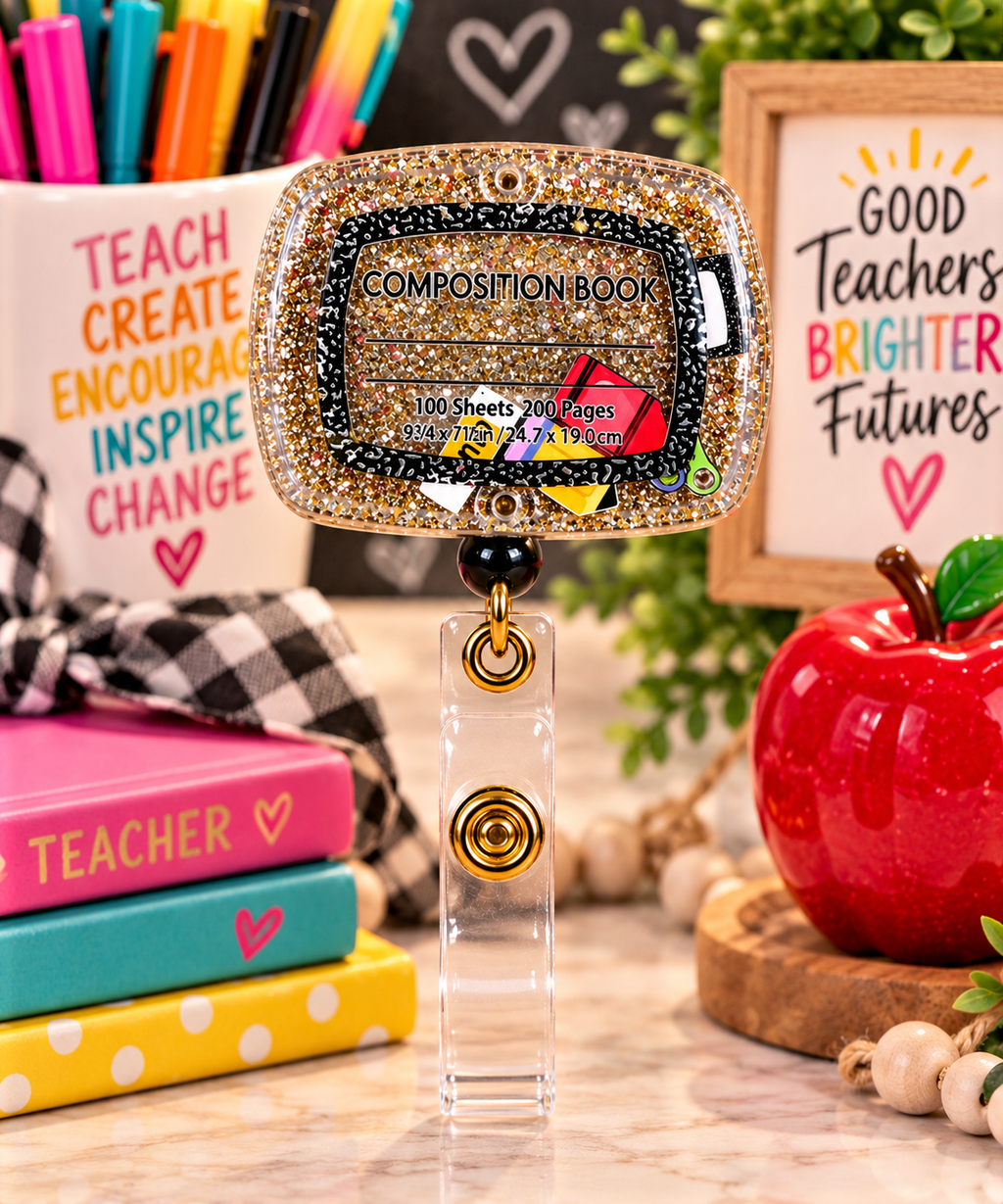 Composition book-inspired badge reel with clear snap strap in a colorful teacher desk display