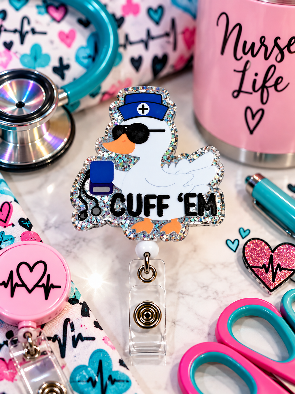 Cuff 'Em nurse duck badge reel with sunglasses, blue nurse cap, and glitter border