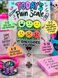 It Only Goes to Ten badge reel with colorful pain scale faces and green glitter