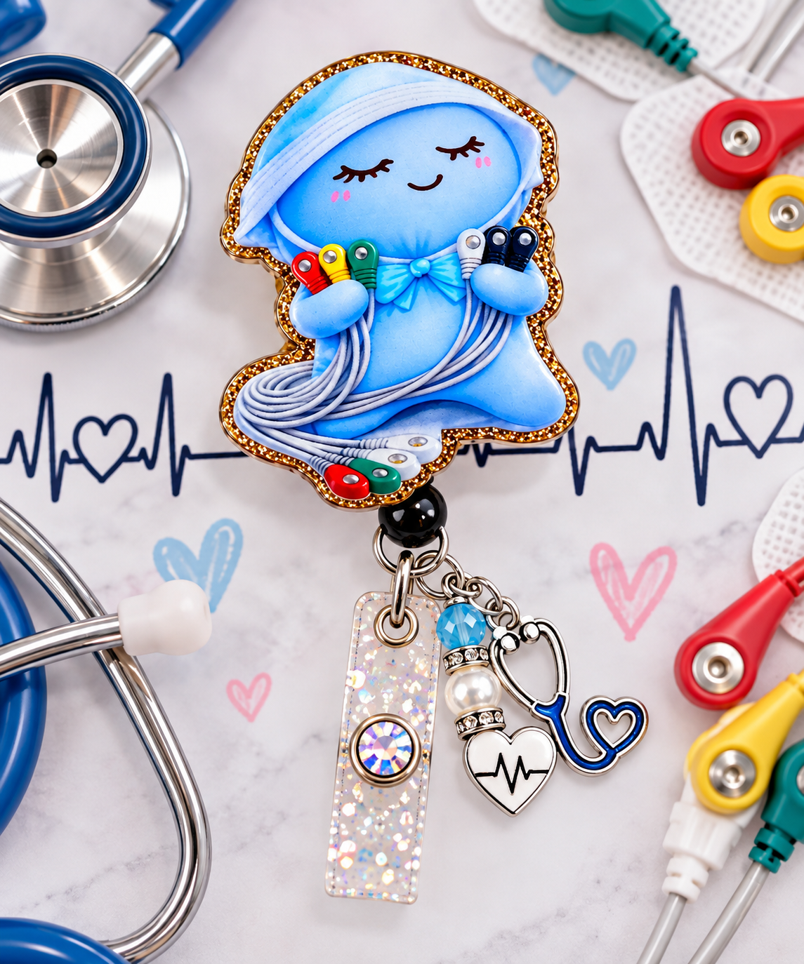 Blue EKG lead character badge reel displayed beside ECG electrode props