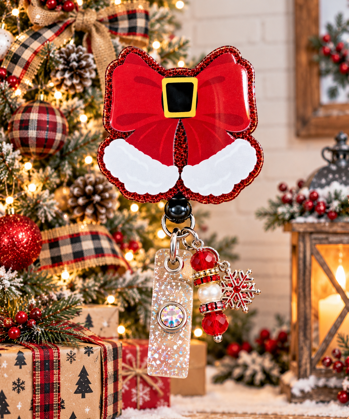 Santa bow badge reel with iridescent glitter strap and gem-accented snap
