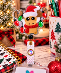Christmas reindeer badge reel with glitter Santa hat, red scarf, and red and green light artwork